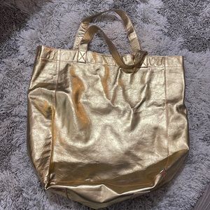 Annette Olivieri huge gold leather tote neon orange seams